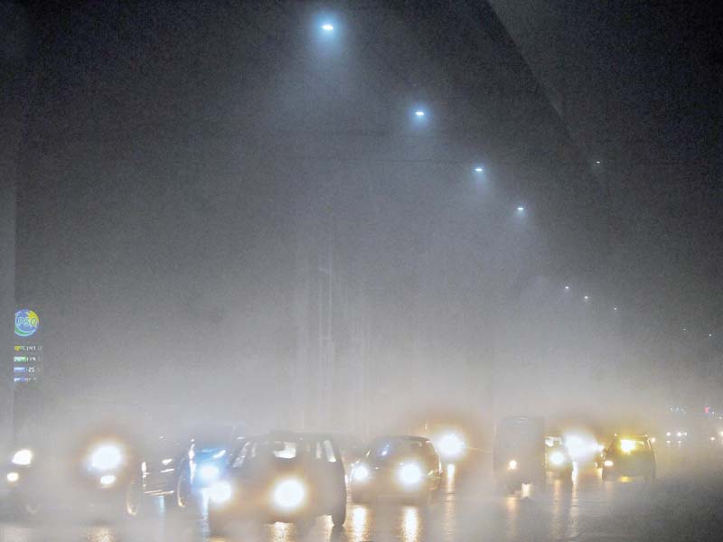 vehicles drive in dense fog in rawalpindi on saturday night photo nni