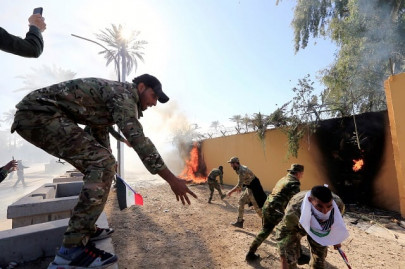violent protests erupt around us embassy in baghdad after us air strikes violent protests erupt around us embassy in baghdad after us air strikes