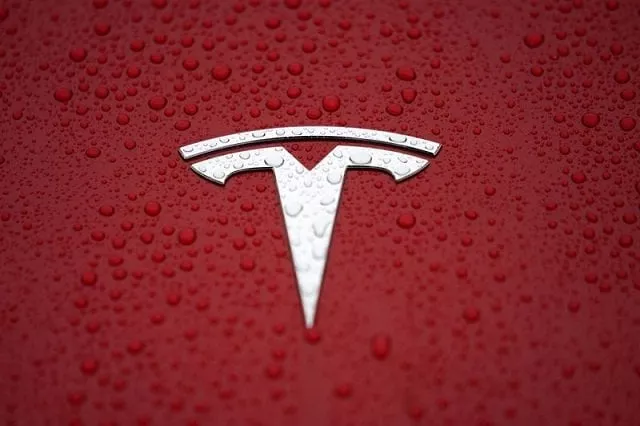 a tesla logo is seen at a groundbreaking ceremony of tesla shanghai gigafactory in shanghai china january 7 2019 photo reuters a tesla logo is seen at a groundbreaking ceremony of tesla shanghai gigafactory in shanghai china january 7 2019 photo reuters
