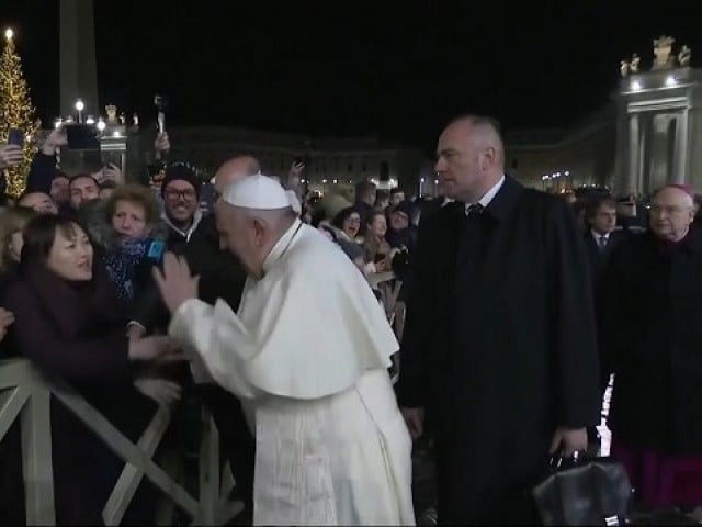 photos of francis slapping at the woman 039 s hand to free himself was an instant hit on social media photo file