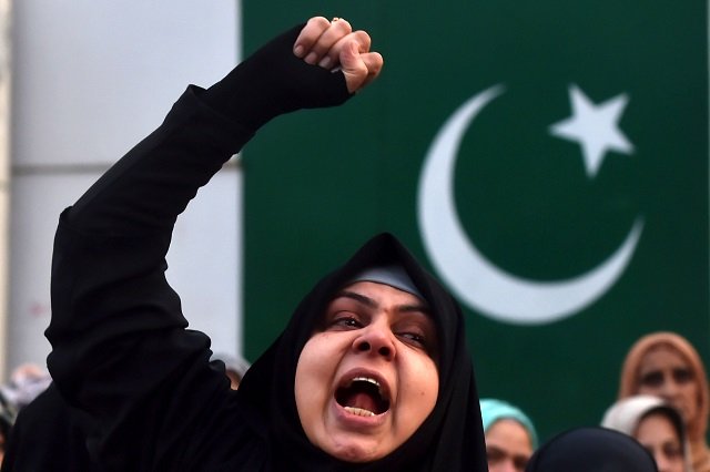 a protester shouts slogans against the united states during a demonstration following a us airstrike that killed top iranian commander qasem soleimani in iraq in lahore on january 3 2020 photo afp