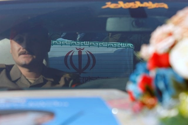 a coffin is seen inside a car during the funeral of the iranian major general qassem soleimani top commander of the elite quds force of the revolutionary guards and the iraqi militia commander abu mahdi al muhandis who were killed in an air strike at baghdad airport in baghdad iraq photo reuters a coffin is seen inside a car during the funeral of the iranian major general qassem soleimani top commander of the elite quds force of the revolutionary guards and the iraqi militia commander abu mahdi al muhandis who were killed in an air strike at baghdad airport in baghdad iraq photo reuters