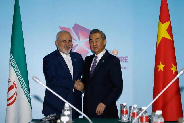 a file photo of chinese and iranian foreign ministers photo reuters a file photo of chinese and iranian foreign ministers photo reuters