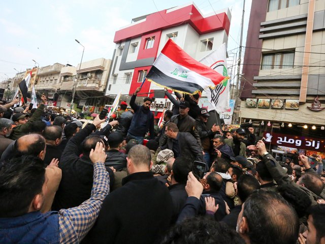 mourners attend the mass ceremony to honour gen soleimani in baghdad photo afp