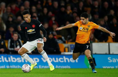 man utd held by wolves in fa cup stalemate man city cruise through