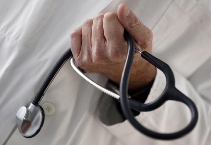 a reuters file photo of a doctor holding stethoscope