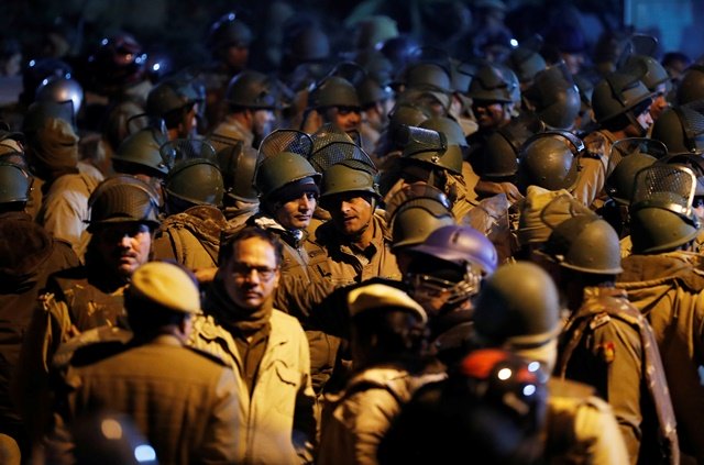 police in riot gear stand guard inside the jawaharlal nehru university jnu after clashes between students in new delh photo reuters