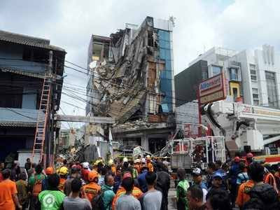 at least two injured in jakarta building collapse