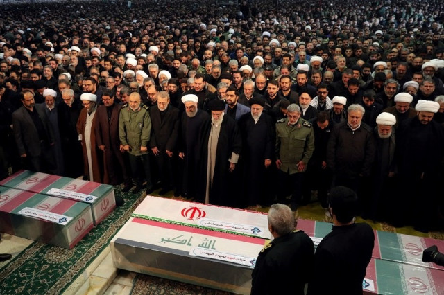 iran 039 s supreme leader ayatollah ali khamenei and iranian president hassan rouhani pray near the coffins of iranian major general qassem soleimani head of the elite quds force and iraqi militia commander abu mahdi al muhandis who were killed in an air strike at baghdad airport in tehran iran january 6 2020 photo reuters iran 039 s supreme leader ayatollah ali khamenei and iranian president hassan rouhani pray near the coffins of iranian major general qassem soleimani head of the elite quds force and iraqi militia commander abu mahdi al muhandis who were killed in an air strike at baghdad airport in tehran iran january 6 2020 photo reuters