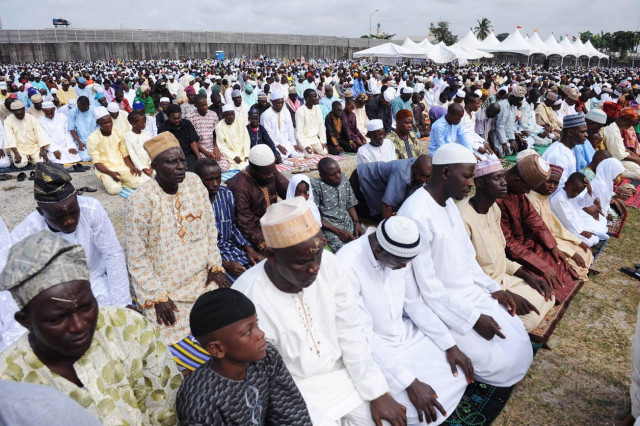 muslims pray on the first day of eid al fitr at obalende praying ground in lagos on august 19 2012 photo afp muslims pray on the first day of eid al fitr at obalende praying ground in lagos on august 19 2012 photo afp