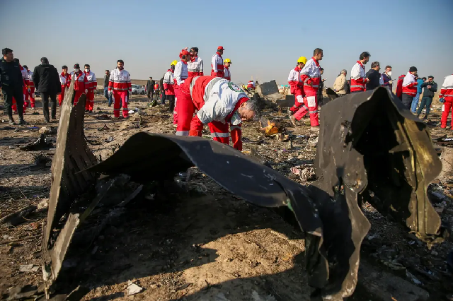 red crescent workers check the debris from the ukraine international airlines plane that crashed after take off from iran 039 s imam khomeini airport on the outskirts of tehran photo reuters red crescent workers check the debris from the ukraine international airlines plane that crashed after take off from iran 039 s imam khomeini airport on the outskirts of tehran photo reuters