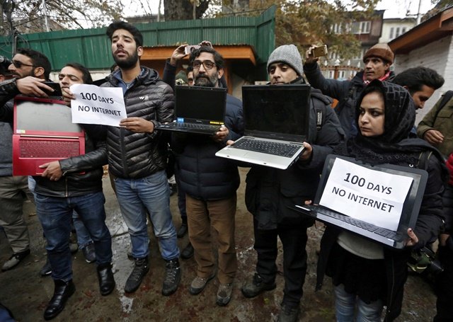 file photo kashmiri journalists display laptops and placards during a protest demanding restoration of internet service in srinagar photo reuters