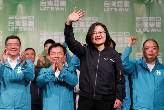 incumbent taiwan president tsai ing wen waves to her supporters after her election victory at a rally outside the democratic progressive party dpp headquarters in taipei taiwan january 11 2020 photo reuters