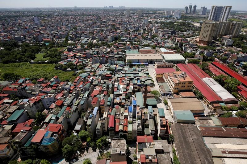 a textile factory is seen inside a residential area in hanoi vietnam july 2 2018 photo reuters