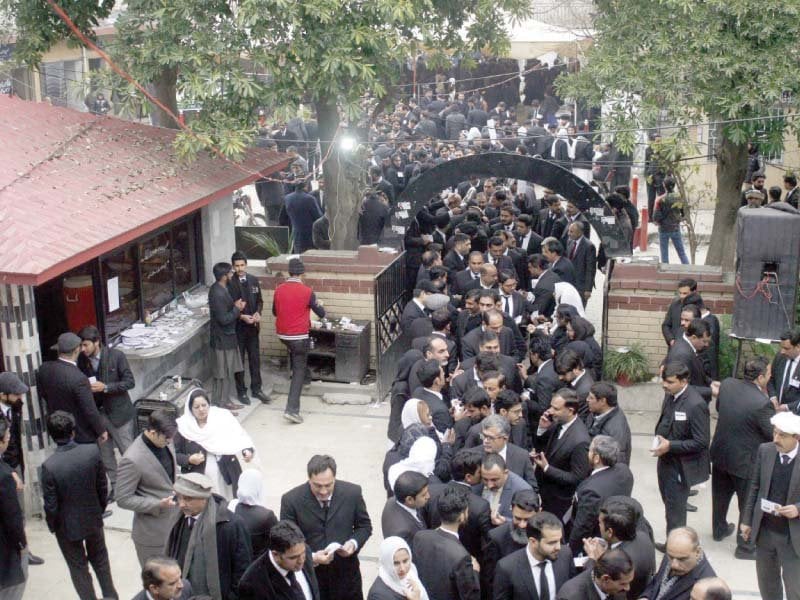 lawyers arrive to cast their votes in the rawalpindi bar association elections photo nni