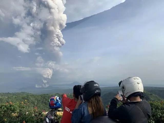 the local disaster office said it had evacuated over 2 000 residents living on the volcanic island which lies inside a bigger lake formed by previous volcanic activity photo afp the local disaster office said it had evacuated over 2 000 residents living on the volcanic island which lies inside a bigger lake formed by previous volcanic activity photo afp