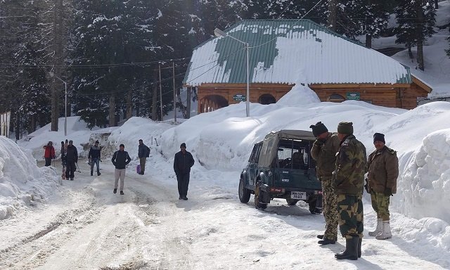 indian security officials stand near the gondola at gulmarg in indian administered kashmir photo afp