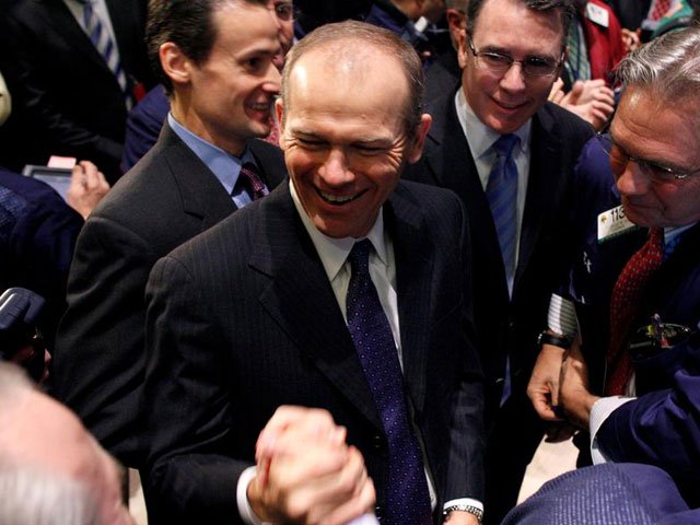 nielsen ceo david calhoun c is congratulated after his company 039 s ipo opened on the floor of the new york stock exchange january 26 2011 photo reuters