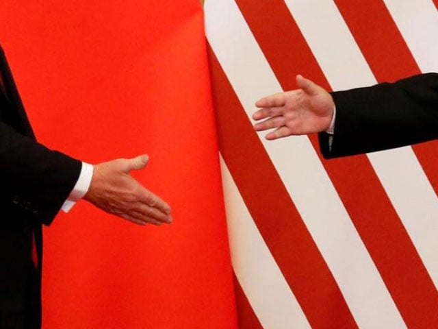 us president donald trump and china 039 s president xi jinping shake hands after making joint statements at the great hall of the people in beijing china photo reuters file