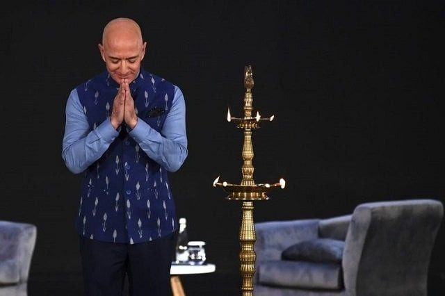 amazon chief jeff bezos greets the audience at an amazon meeting in new delhi photo afp amazon chief jeff bezos greets the audience at an amazon meeting in new delhi photo afp