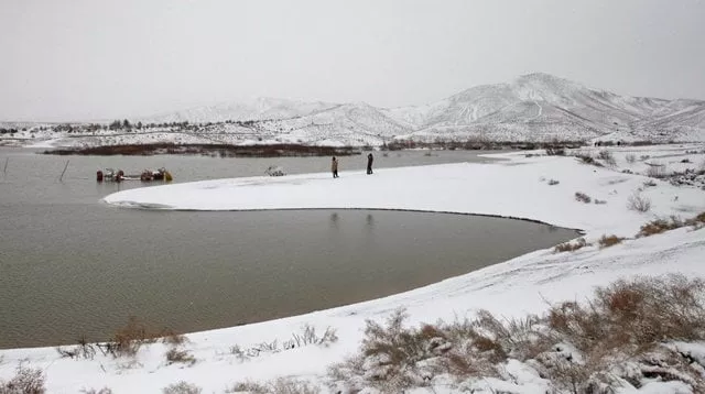 people visit the snow covered hanna lake after a snowfall on the outskirts of quetta photo reuters people visit the snow covered hanna lake after a snowfall on the outskirts of quetta photo reuters