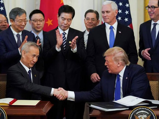 chinese vice premier liu he and us president donald trump shake hands after signing quot phase one quot of the us china trade agreement during a ceremony in the east room of the white house in washington us january 15 2020 photo reuters