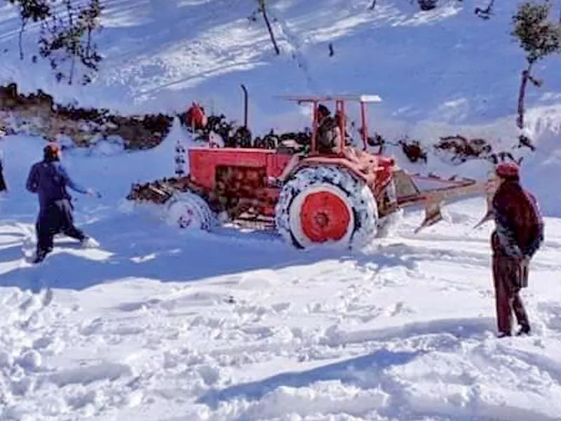 district administration officials clearing road in south waziristan after heavy snowfall photo express district administration officials clearing road in south waziristan after heavy snowfall photo express