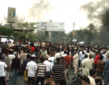 workers unite sacked mills workers try to storm factory in faisalabad