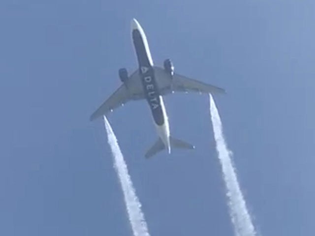 a delta airlines flight 89 boeing 777 200 jet empties its fuel tanks as it makes an emergency landing at los angeles international airport seen from ocean view elementary school in whittier california us january 14 2020 photo reuters