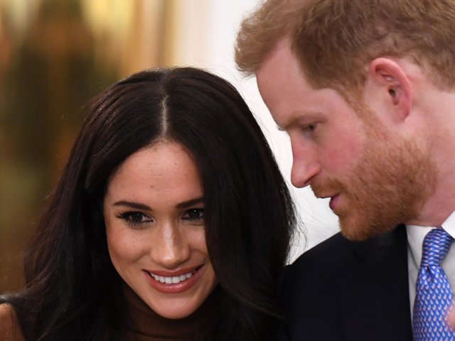 in this file photo taken on january 07 2020 harry and meghan react during their visit to canada house in london photo afp