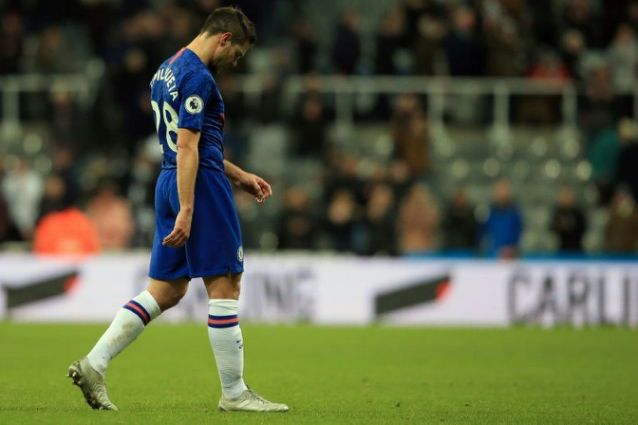 a slump in form from chelsea has left the door open for manchester united tottenham and arsenal for the fourth spot photo afp