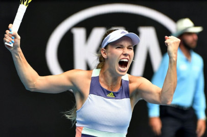 emotional wozniacki keeps final tournament alive at australian open