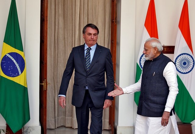 india 039 s prime minister narendra modi extends his hand for a handshake with brazil 039 s president jair bolsonaro ahead of their meeting at hyderabad house in new delhi photo reuters