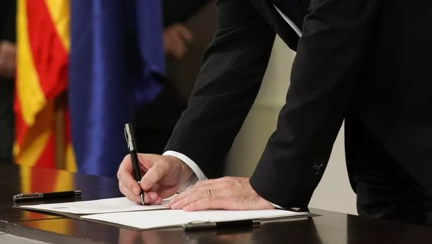 representational image of a man signing a document photo reuters representational image of a man signing a document photo reuters