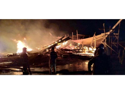 scrap warehouse catches fire