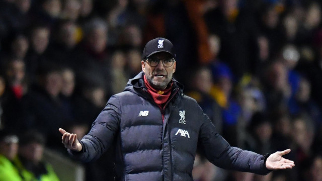 jurgen klopp showed his focus is very much on a first premier league title for 30 years as he made 11 changes to the side photo afp jurgen klopp showed his focus is very much on a first premier league title for 30 years as he made 11 changes to the side photo afp