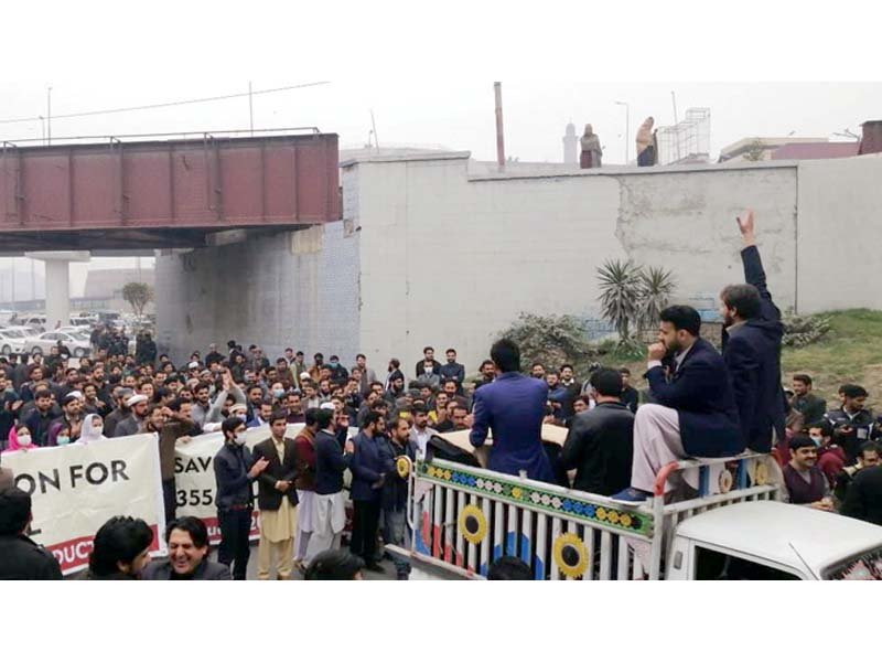 young doctors protesting for their demands by blocking the road leading to lady reading hospital in peshawar photo file