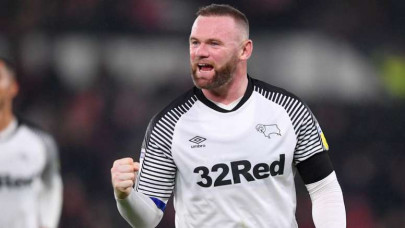 rooney scores for derby leeds back on top of championship rooney scores for derby leeds back on top of championship