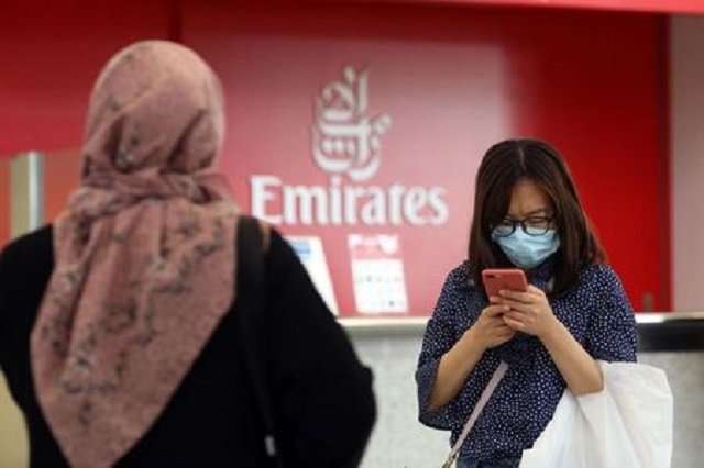 a traveller wears a mask at the dubai international airport after the uae 039 s ministry of health and community prevention confirmed the country 039 s first case of coronavirus in dubai united arab emirates january 29 2020 photo reuters