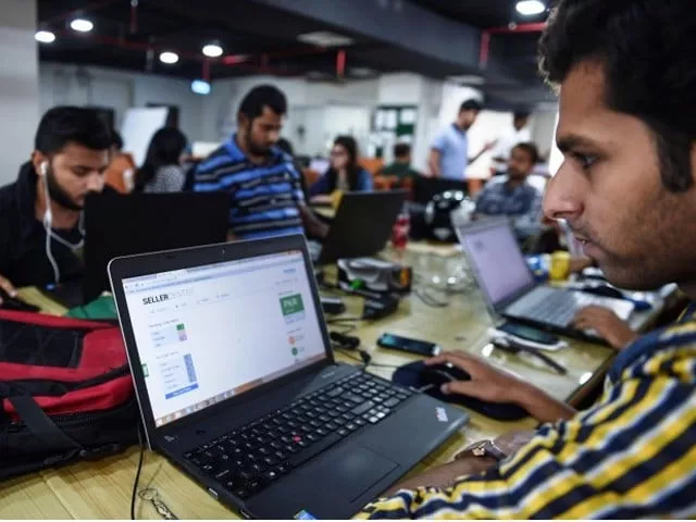 pakistani employees of online marketplace company kaymu at work in karachi photo afp pakistani employees of online marketplace company kaymu at work in karachi photo afp