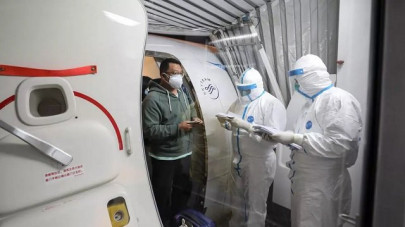 china flies citizens home to virus hit wuhan