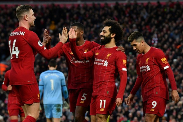 liverpool equalled a premier league record with a 20th straight home win at anfield photo afp