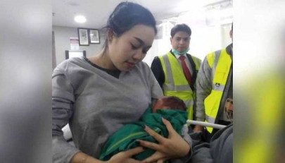 flight makes emergency landing after woman goes into labour