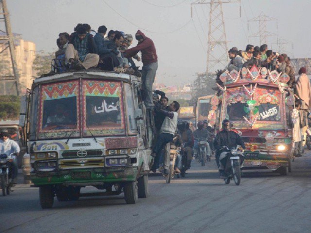 a file photo of local buses in karachi photo express