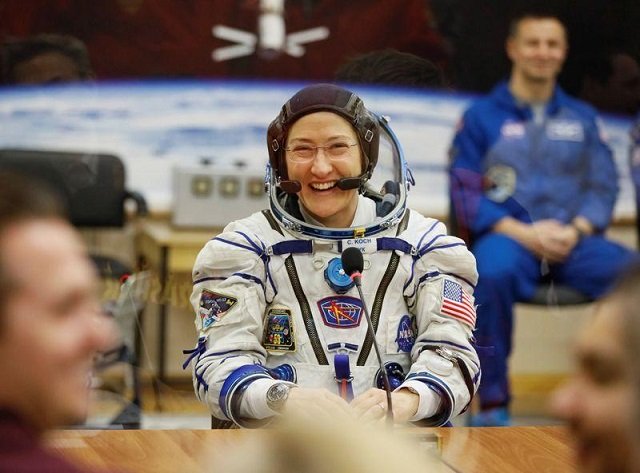 the international space station iss crew member christina koch of the us smiles after donning space suit check shortly before launch at the baikonur cosmodrome kazakhstan march 14 2019 photo reuters