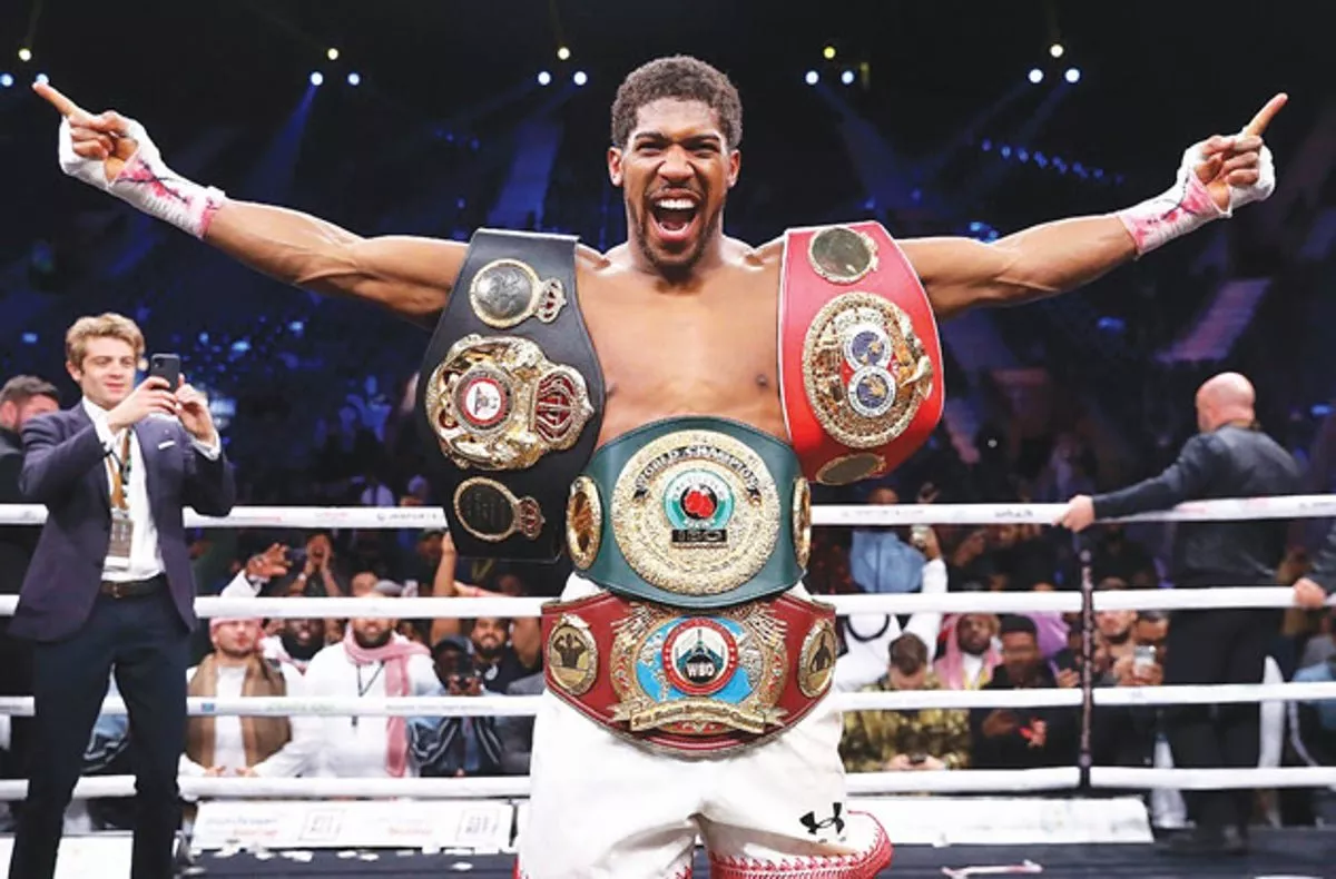 british boxer beat andy ruiz jr in saudi arabia last year to regain the wba ibf and wbo titles photo afp british boxer beat andy ruiz jr in saudi arabia last year to regain the wba ibf and wbo titles photo afp
