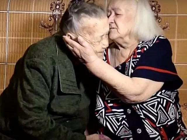 yulia and rozalina kharitonova now 92 and 94 hugged and kissed as their family members watched in tears screen grab yulia and rozalina kharitonova now 92 and 94 hugged and kissed as their family members watched in tears screen grab