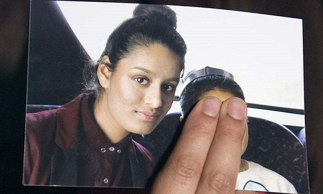 in this file photo taken on february 22 2015 renu begum eldest sister of missing british girl shamima begum holds a picture of her sister while being interviewed by the media in central london photo afp file