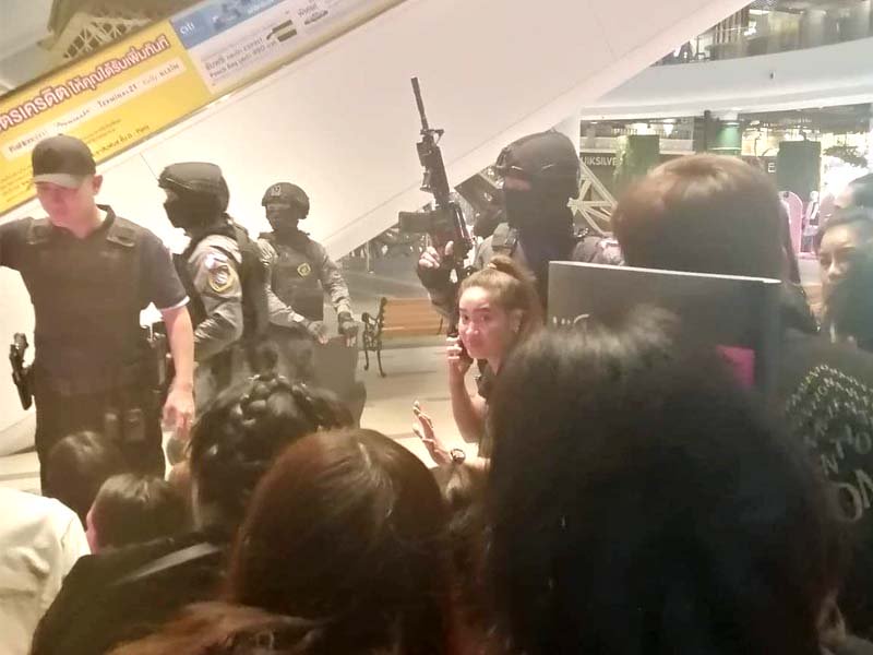 people are evacuated from a shopping mall by members of security forces after a shooting rampage in the city of nakhon ratchasima thailand photo reuters