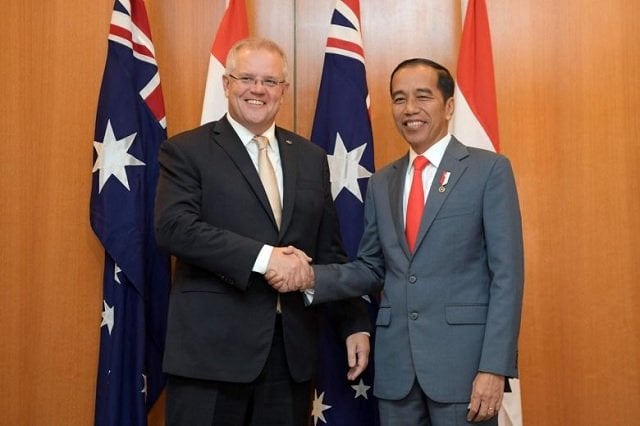 australian prime minister scott morrison left shakes hands with indonesian president joko widodo before a meeting at parliament house in canberra on feb 10 2020 photo afp